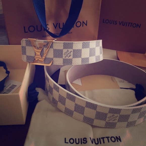 Louis VUITTON Leather belt with a blue checkerboard pat…